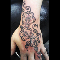 Custom hand tattoo, West Coast Tattoos in Blackpool